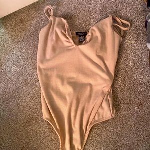 bodysuit, somewhat comfortable, stays in place